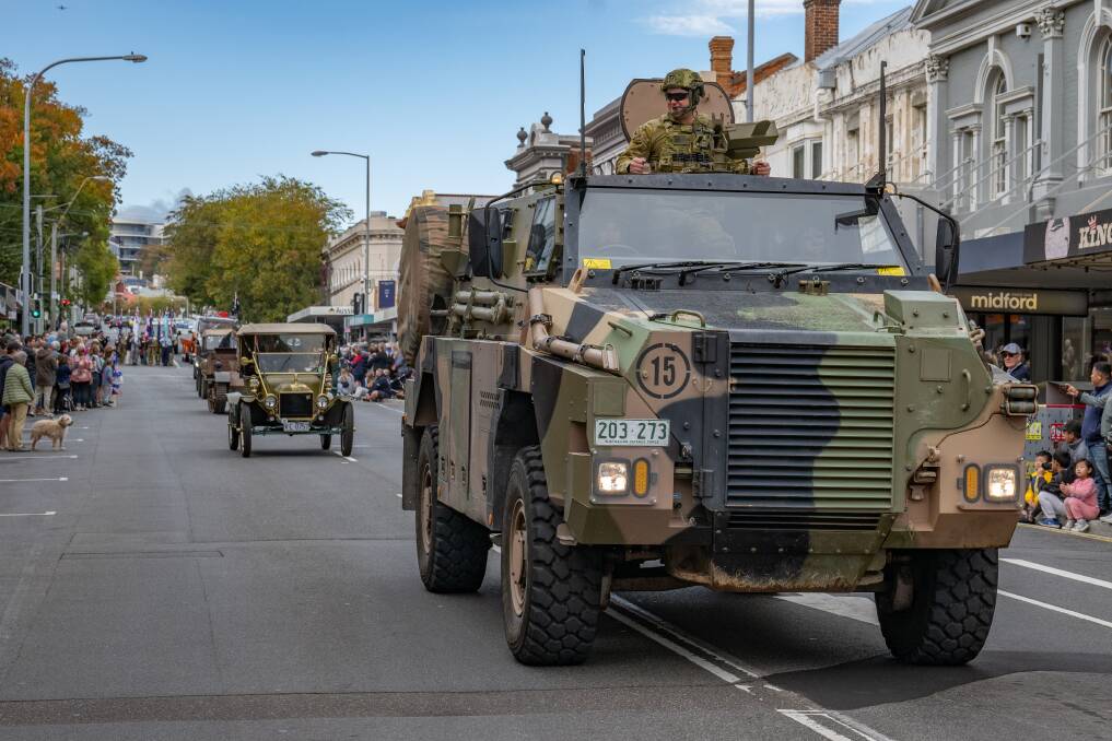 Lance Corporal Selina Schlimmer of 12/40 Battalion RTR and CPL Nicholas Bowman drive the Hawkei light protected mobility vehicle during the March of Remembrance
11 am service, ANZAC day at the Launceston cenotaph. Cenotaph 100 year anniversary. Picture: Paul Scambler.